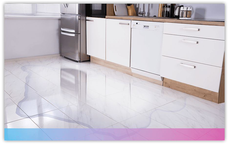 A kitchen with a large water leak that has pooled on the tile
