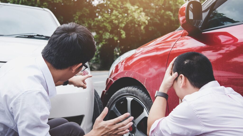 people in distress observing car accident