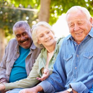 Three seniors smiling together